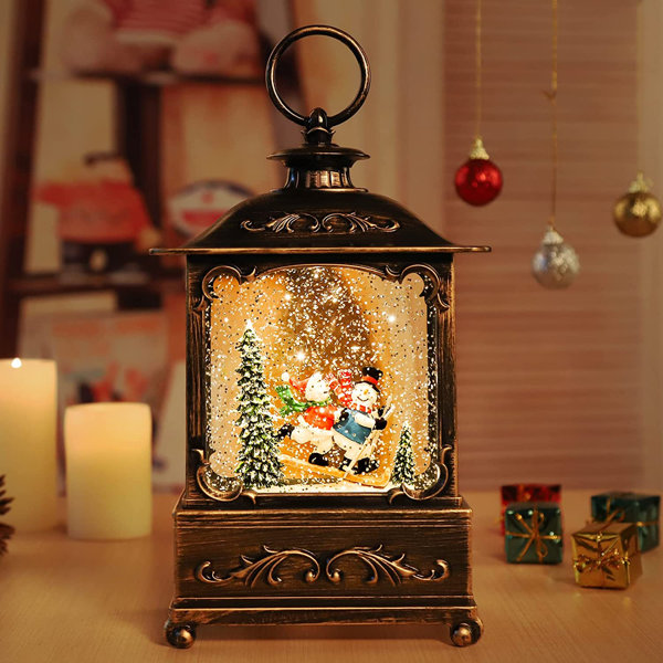 The Holiday Aisle® Christmas Lantern Snow Globe Decoration Lanterns Lit
